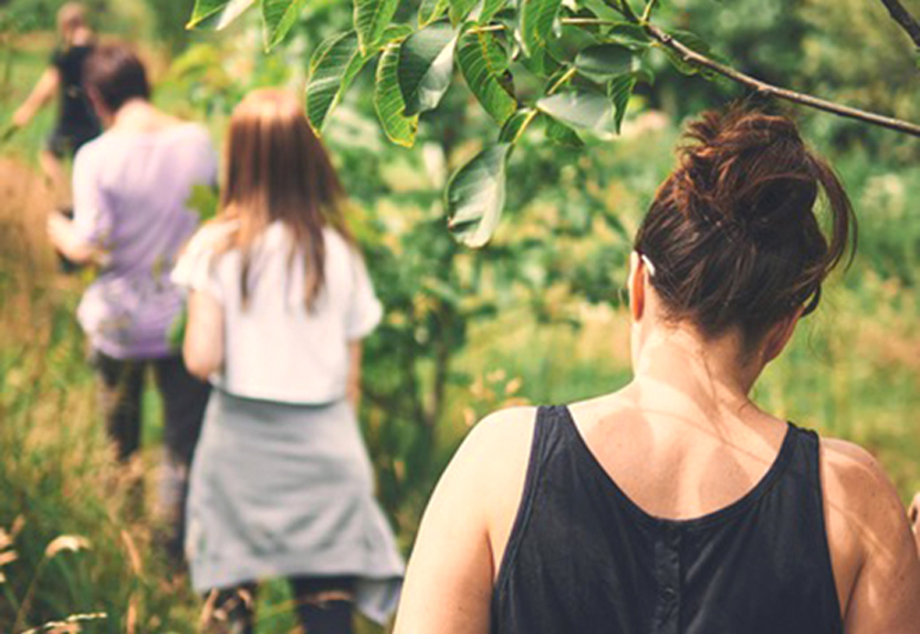 Young people from Grow out walking in nature